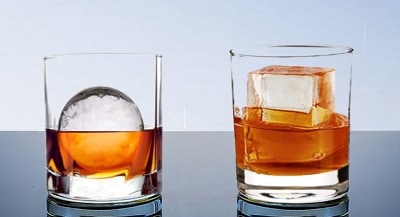 https://www.whisqiy.com/wp-content/uploads/2022/03/A-glass-of-whiskey-with-large-ice-sphere-and-a-glass-of-whiskey-with-a-large-ice-cube-S.jpg
